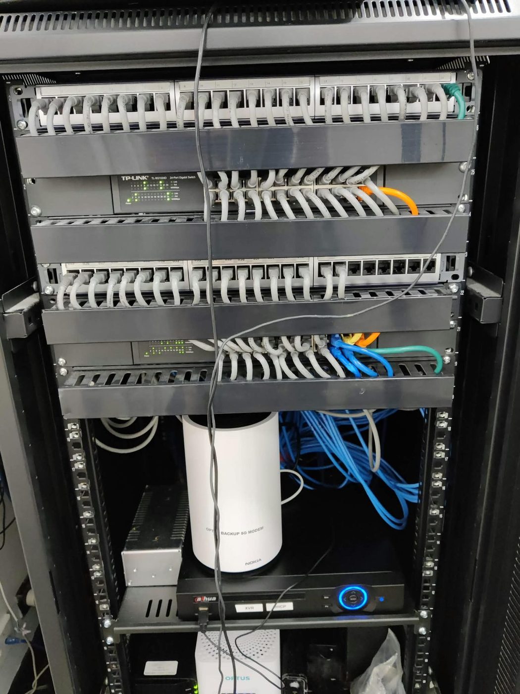 Network rack with patch panels and switches installed by COMPwize