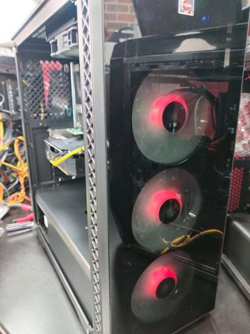 A Ryzen gaming PC build running with red case fans