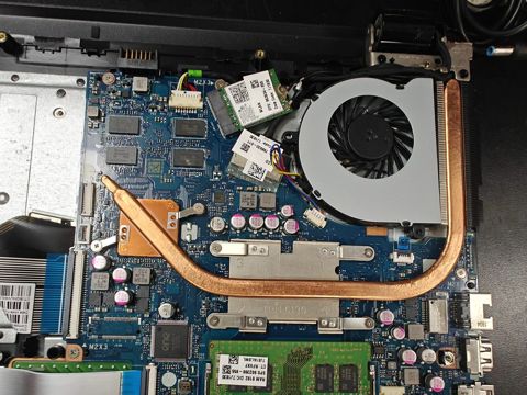 Laptop cooling system with the copper heatpipe and fan refitted