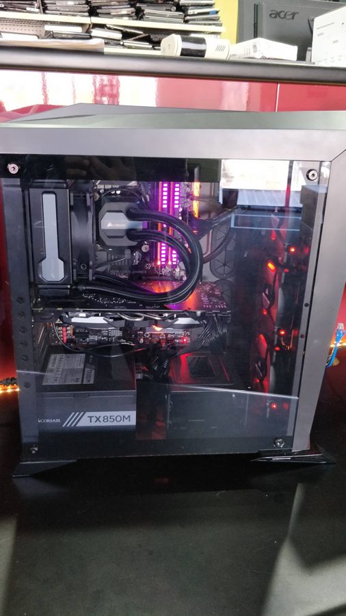 A custom-built gaming PC with a liquid cooler and lit memory