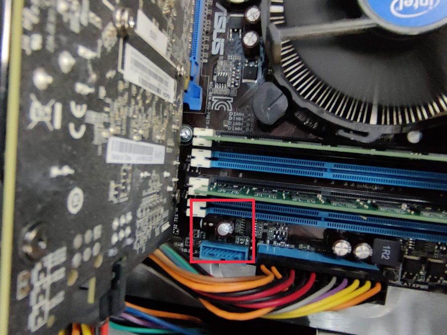 Diagnosing a desktop motherboard, with the front panel header highlighted